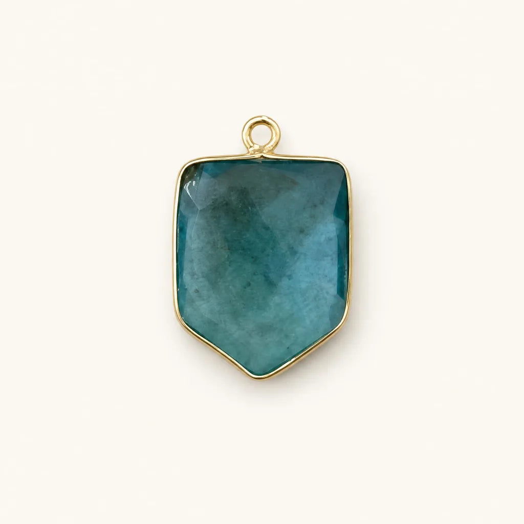 Teal quartz shield charm