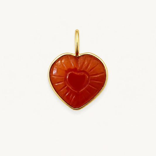 Carved carnelian heart charm