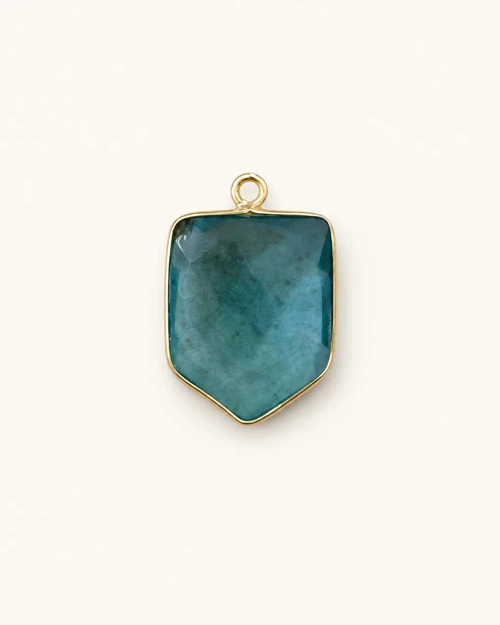 Teal quartz shield charm